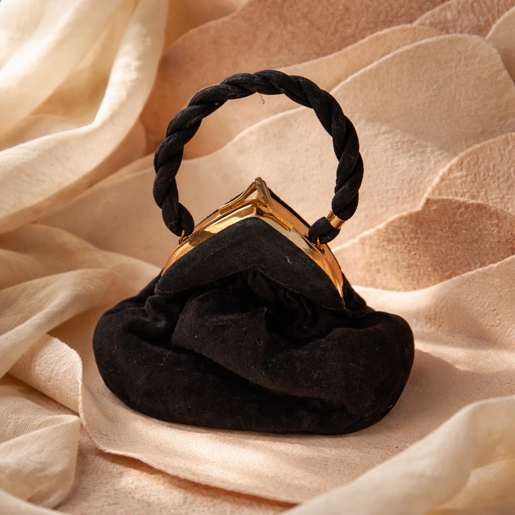 Vintage black evening bag with twisted handle